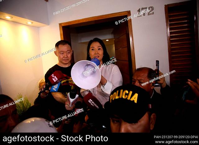 06 December 2023, Peru, Lima: The children of former Peruvian President Fujimori, Kenji (l) and Keiko (r), give a press conference at Keiko's home after picking...