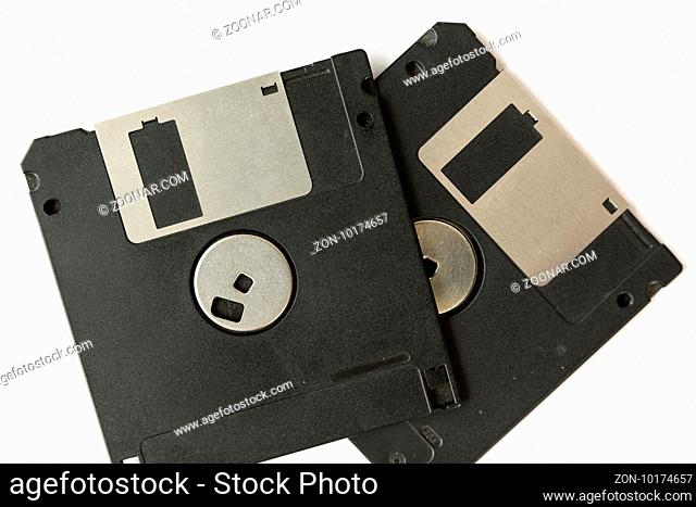 Two black floppy disks isolated on a white background