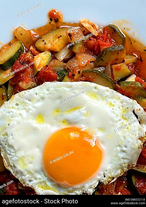 Pisto manchego with fried egg. Spain