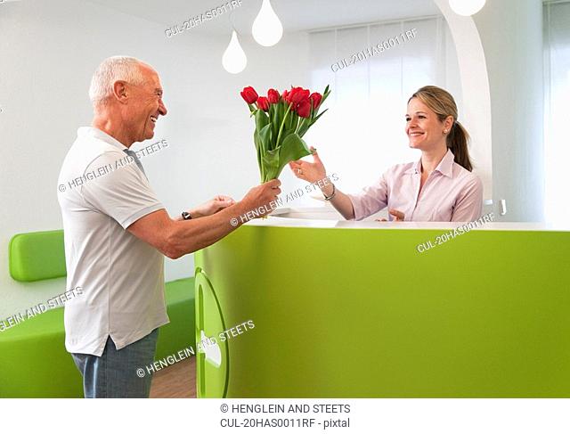 Patient thanking receptionist