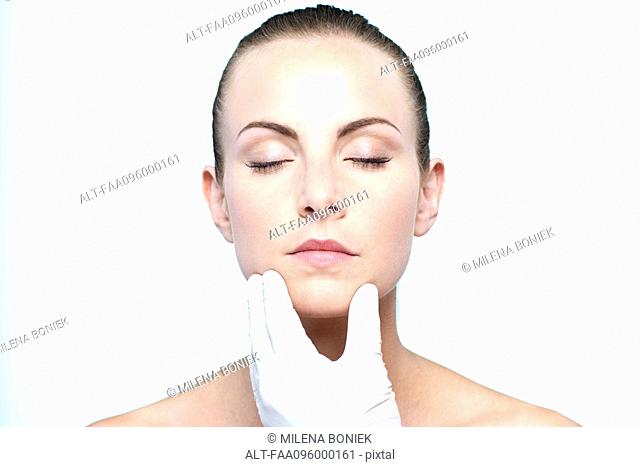 Woman receiving collagen injection