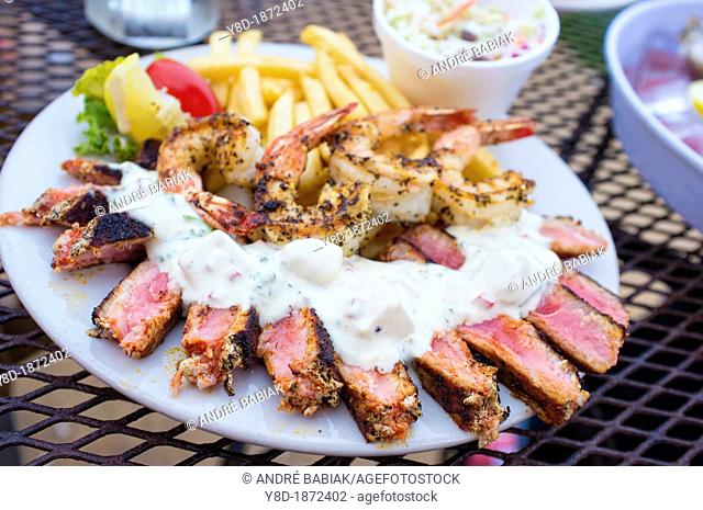 Seafood Sampler Plate of grilled tuna steak slices and grilled shrimps, Rockport-Fulton, Texas, USA