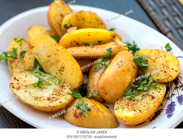 potatoes with herbs sprinkled with green parsley