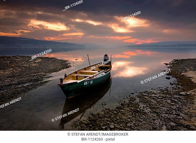Fishing boat on the Reichenau island on Lake Constance at sunset, Baden-Wuerttemberg, Germany