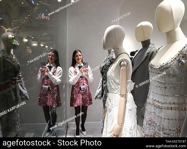RUSSIA, MOSCOW - NOVEMBER 27, 2023: A customer visits a Russian fashion designers' shop at the GUM department store during the pre-opening of the BRICS+ Fashion...