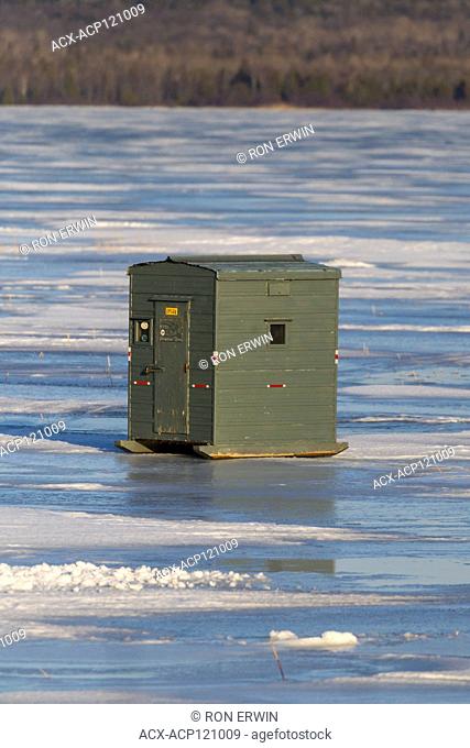 Ice fishing hut on Lake Wolsey, Manitoulin Island, Ontario, Canada