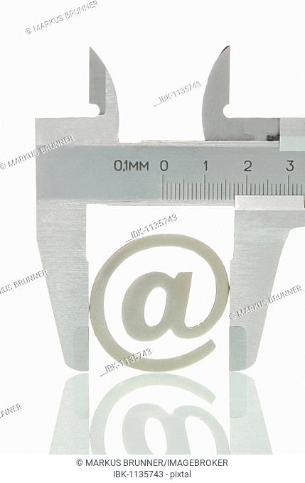 Calipers with the at-symbol, symbolic image for analysis of the Internet