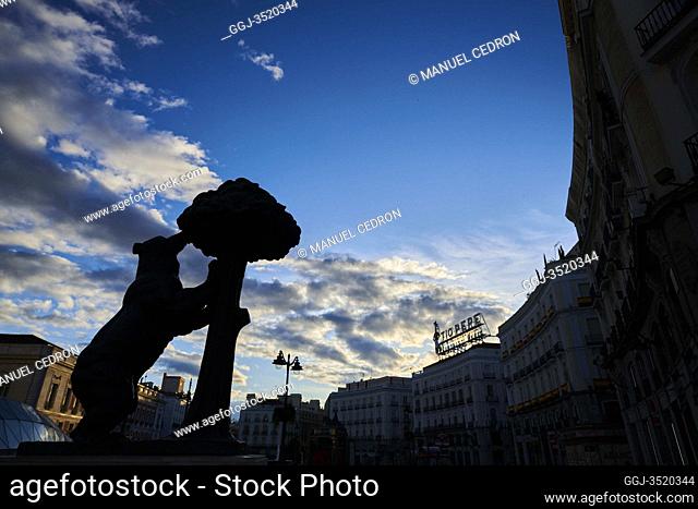 Empty streets and social distancing during the Coronavirus outbreak. Puerta del Sol with Oso and Madrono statue on April 29, 2020 in Madrid