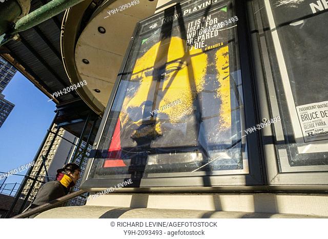 A poster outside the Angelika Film Center in Greenwich Village in New York on Saturday, December 7, 2013 advertises the biography film of the late Nelson...