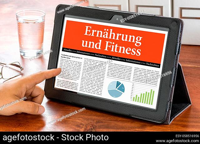A tablet computer on a desk - Nutrition and Fitness - Ernaehrung und Fitness German