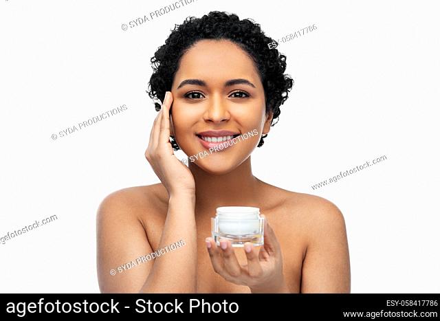 young african american woman with moisturizer