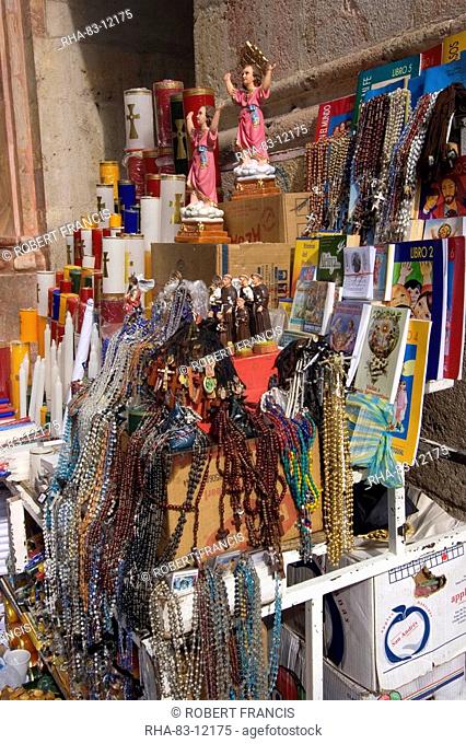 Stall selling Catholic paraphenalia at the entrance to the new Catedral de la Inmaculada Concepcion built in1885, Cuenca, Azuay Province, Southern Highlands