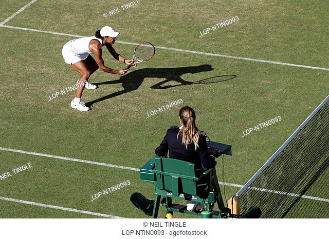 England, London, Wimbledon, An umpire watches the tennis at the Wimbledon Tennis Championships 2008