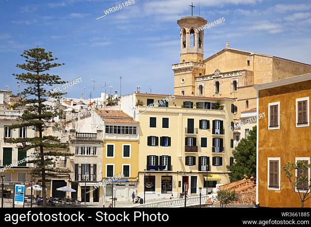 Spain, Menorca, View of Placa Espanya and Church of Santa Maria in background