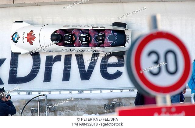 Four-man bobsleigh with Nick Poloniato, Daniel Sunderland, Derek Plug and Keenan Macdougall of Canada in action during the 1st run in Schoenau am Koenigssee