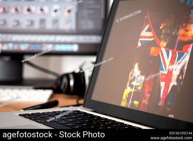 Workstation of a professional photographer developing his raw photos