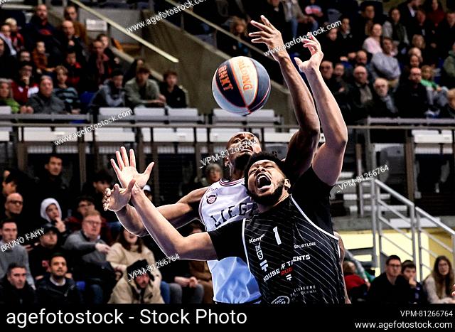 Liege's Kevin Tumba and Kortrijk's Jayden Gardner fight for the ball during a basketball match between RSW Liege Basket and House of Talents Spurs Kortrijk