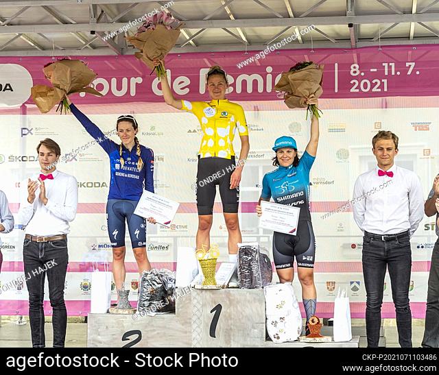 L-R on the podium are seen Morgane Coston (France), Joscelin Lowden (Britain) and Corinna Lechner (Germany) after all stages of the Tour de Feminin...