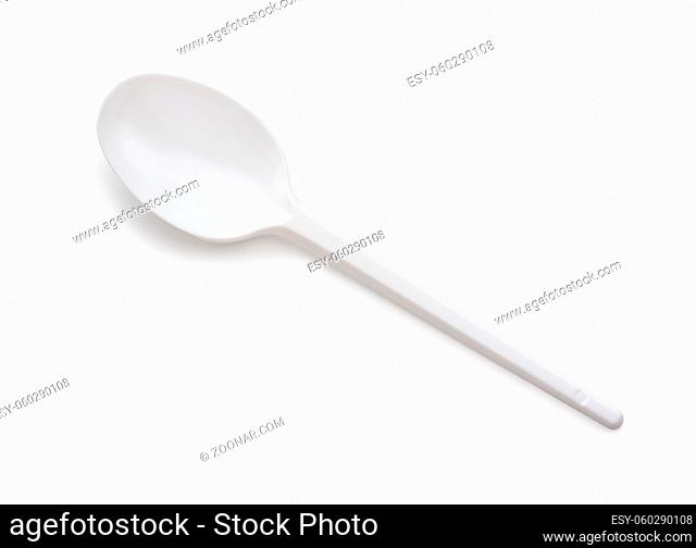 Top view of white disposable plastic spoon isolated on white