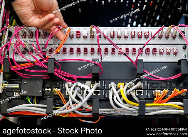 01 December 2022, Bavaria, Nuremberg: In the real-time laboratory at the Chair of Electrical Energy Systems (LEES) at Friedrich-Alexander-Universität...