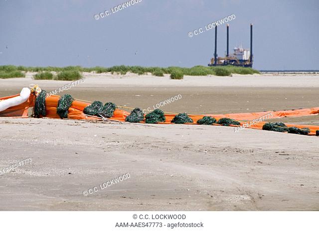 Oil spill booms to protect the nesting area of brown pelicans and terns and gulls at Breton Island NWR from Deepwater Horizon oil spill