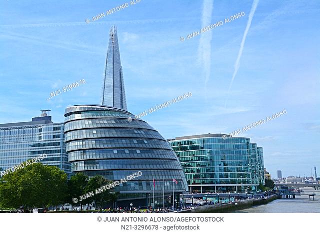 Renzo Piano's The Shard stands out behind Norman Foster's City Hall in the Southwark area on the South bank. Next to it, there are some office buildings at The...