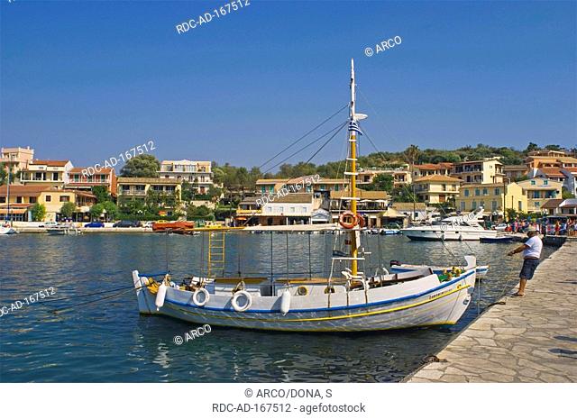 Boat in harbour, Kassiopi, Korfu, Ionian Islands, Greece