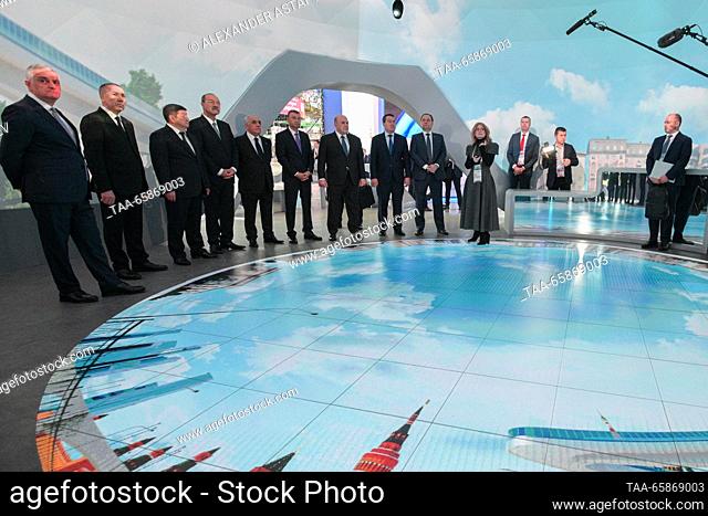 RUSSIA, MOSCOW - DECEMBER 18, 2023: Russia's Prime Minister Mikhail Mishustin (5th R front) and the CIS countries government heads visit the Russia Expo...