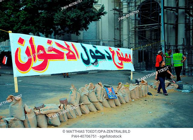 A banner across a road to Tahrir Square reads 'Access denied to members of the Muslim Brotherhood' in Cairo, Egypt, 29 June 2013