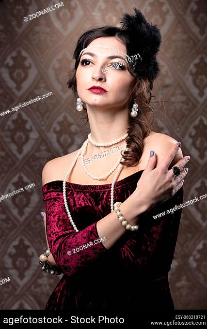 Retro woman portrait. Luxurious lady in vintage style from 20s or 30s