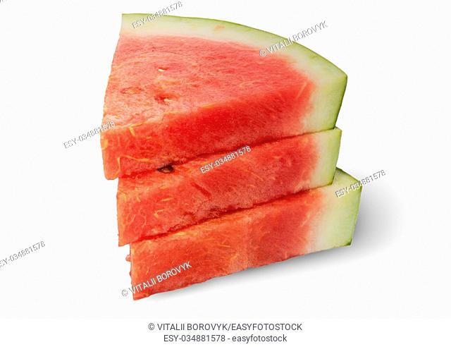Stack of three pieces of ripe red watermelon isolated on white background