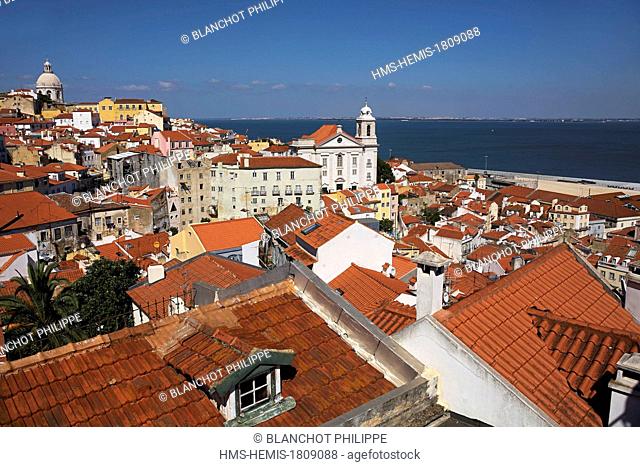 Portugal, Lisbon, view over the roofs of Alfama district, St. Vincent de Fora monastery (Igreja de Sao Vicente de Fora), St Etienne church (Santo Estevao) and...