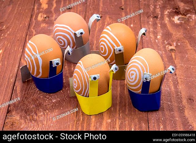 Russia, Kaliningrad, January 26, 2021, by Nadezhda Zima, do it yourself stand for Easter eggs, cardboard stand for Easter eggs in the form of snails