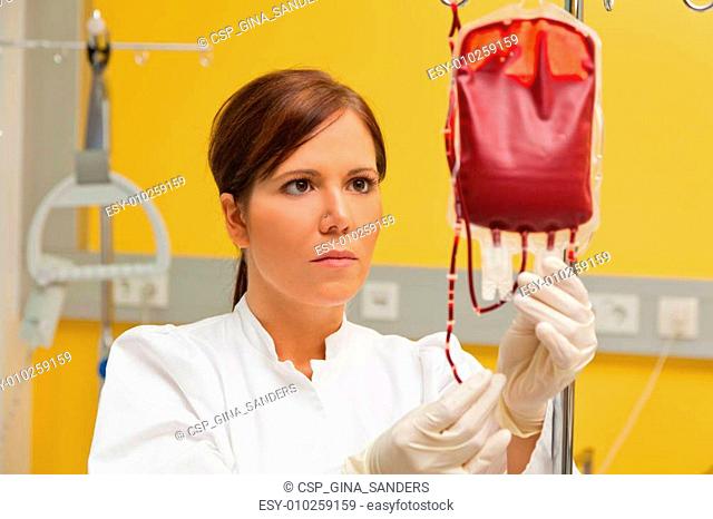 nurse in hospital with blood products