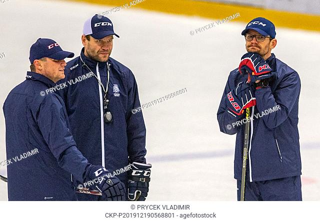 L-R Assistant Coach Ales Kratoska, Head Coach Vaclav Varada and Assistant Coach Patrik Elias attend a training session of the Czech men's national under 20 ice...