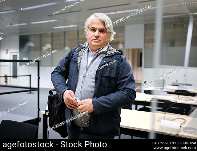 25 January 2022, Schleswig-Holstein, Itzehoe: Mehmet Daimagüler, lawyer for the Nebenklage, stands in the courtroom after one day of proceedings in the trial of...