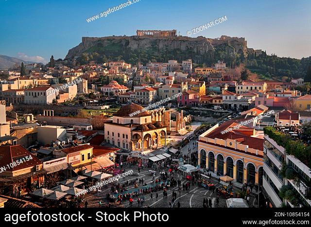 ATHENS, GREECE - FEBRUARY 24, 2017: Aerial View of Monastiraki Square and Acropolis in the Evening, Athens, Greece. Monastiraki is a flea market neighborhood in...