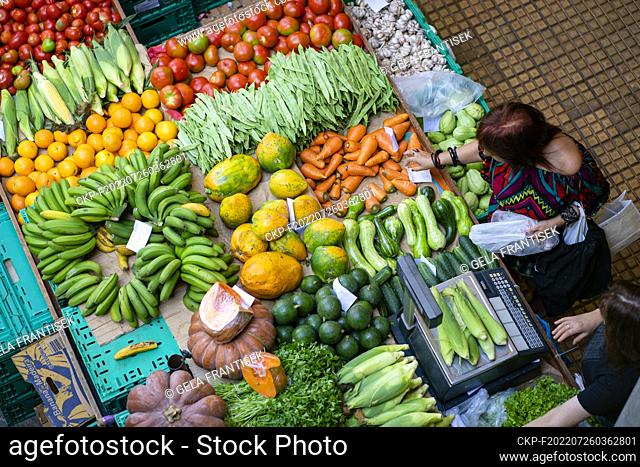 Fruits and vegetables (Madeiran bananas, oranges, tomatoes, patty pans, carrots, beans etc.) at the farmer’s market (Mercado dos Lavradores) in Funchal on the...