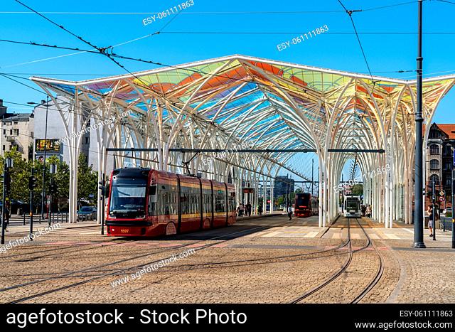 Lodz, Poland - September 9, 2021: trams leave at the modern main tram station in downtown Lodz