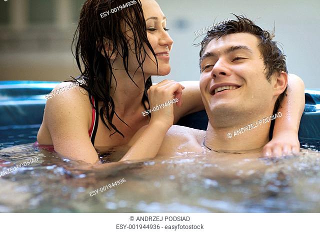 Couple bathing at jacuzzi