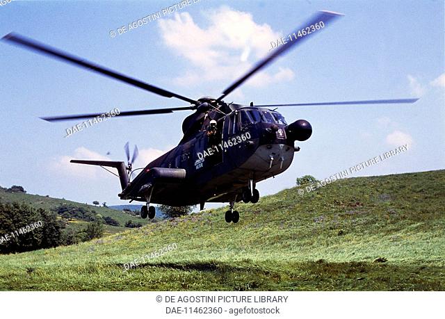 Agusta-Sikorsky HH-3F helicopter, Italian Air Force, during descent into landing. Italy, late 20th century