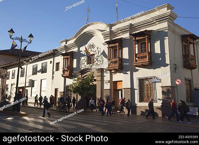 People in front of the colonail building used as Municipalidad del Cusco in Avenida de Sol Square at the historic center, Cusco, Cusco Province