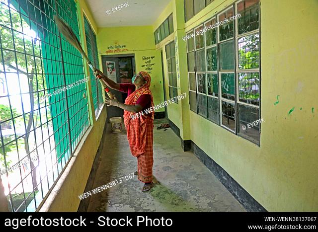 Workers cleans the inside of a classrooms of Basila Primary School. Educational institutions are to begin resumption after 14 months by Covid-19 lockdown
