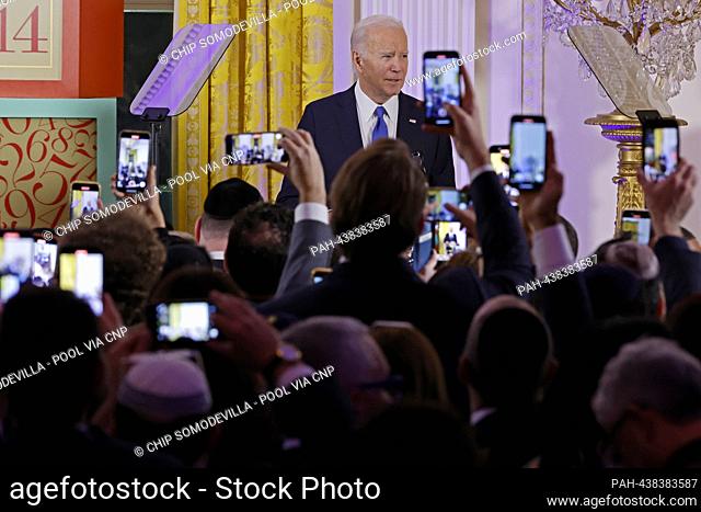 United States President Joe Biden delivers remarks during a Hanukkah holiday reception in the East Room of the White House on December 11, 2023 in Washington