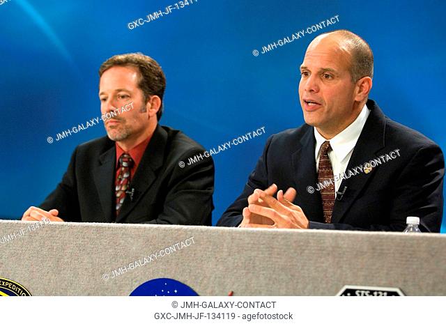 Rick LaBrode (left), lead STS-121 shuttle flight director, and Tony Ceccacci, his space station counterpart for the scheduled July mission