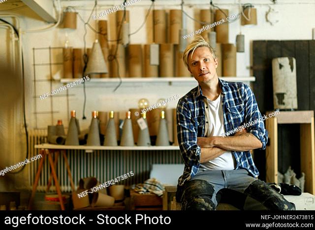 Man sitting in workshop