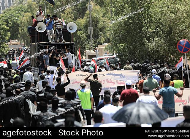 18 July 2023, Iraq, Baghdad: People take part in a protest near the Turkish Embassy in Baghdad, against the shortage of the water supply of Euphrates and Tigris...