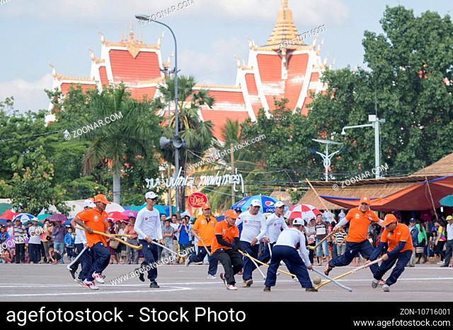 a Game of the traditional Hockey Tikhy or Lao Hockey at a ceremony at the Pha That Luang Festival in the city of vientiane in Laos in the southeastasia