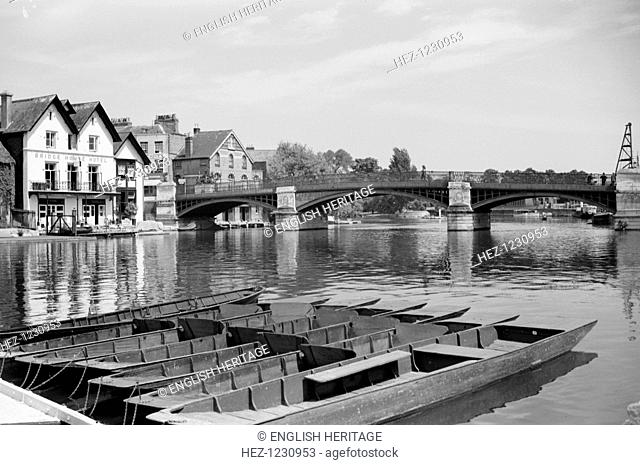 View along the River Thames at Windsor, looking towards Windsor Bridge, Berkshire, c1945-c1965. The Thames at Windsor, with the Bridge House Hotel on the left