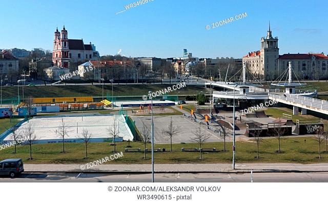 VILNIUS, LITHUANIA - MARCH 27, 2016: Volleyball and basketball sports grounds field near White Bridge through the river Neris